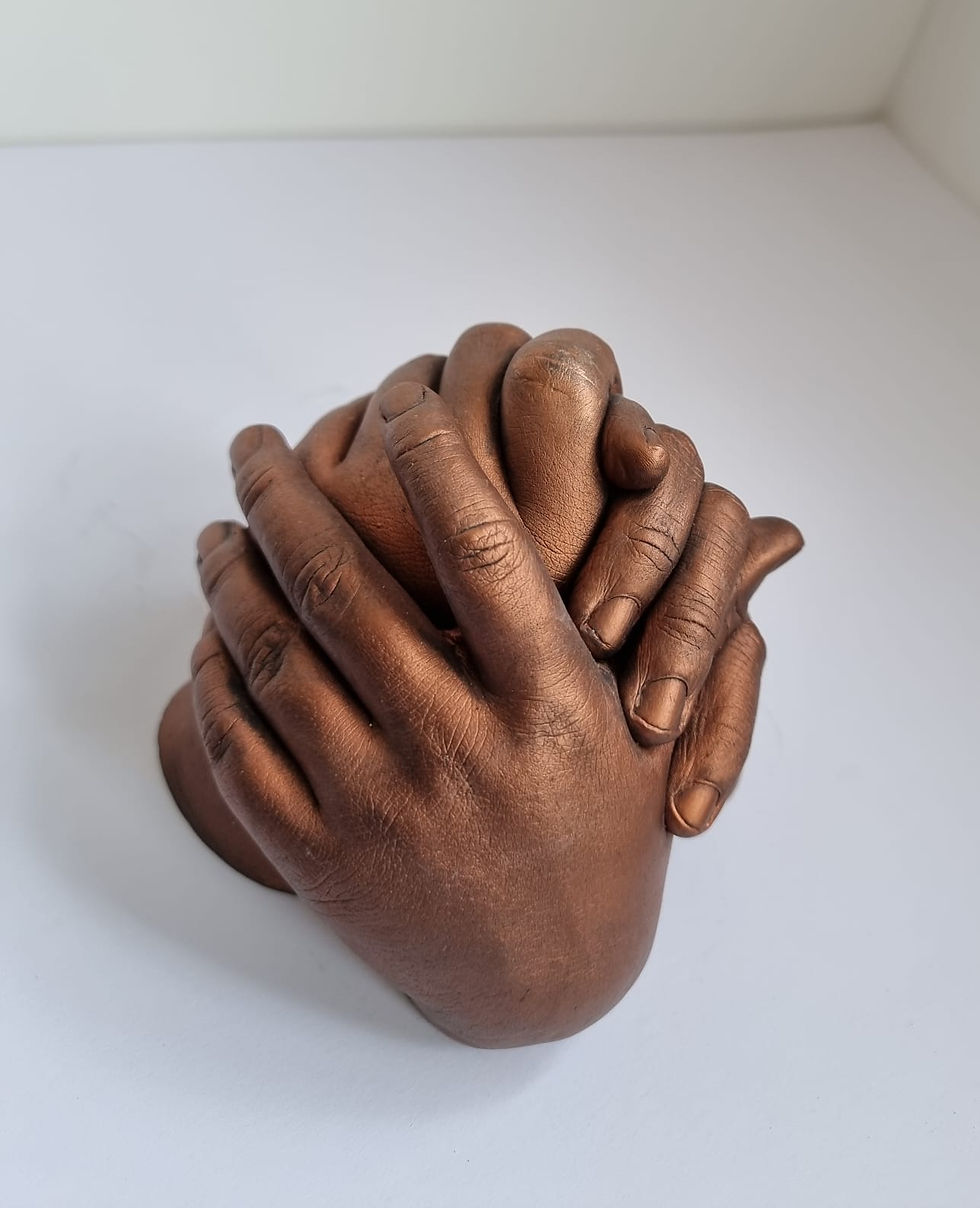 Thumbnail: Hand Entwined