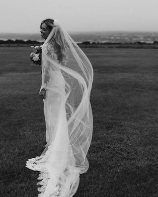 bridal veil cinematically blowing in the wind in the Scottish highlands by sam mcgregor