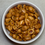Thumbnail: Bowl of roasted peanuts Snacks Galore Hawaii in a white dish. Close-up shot.