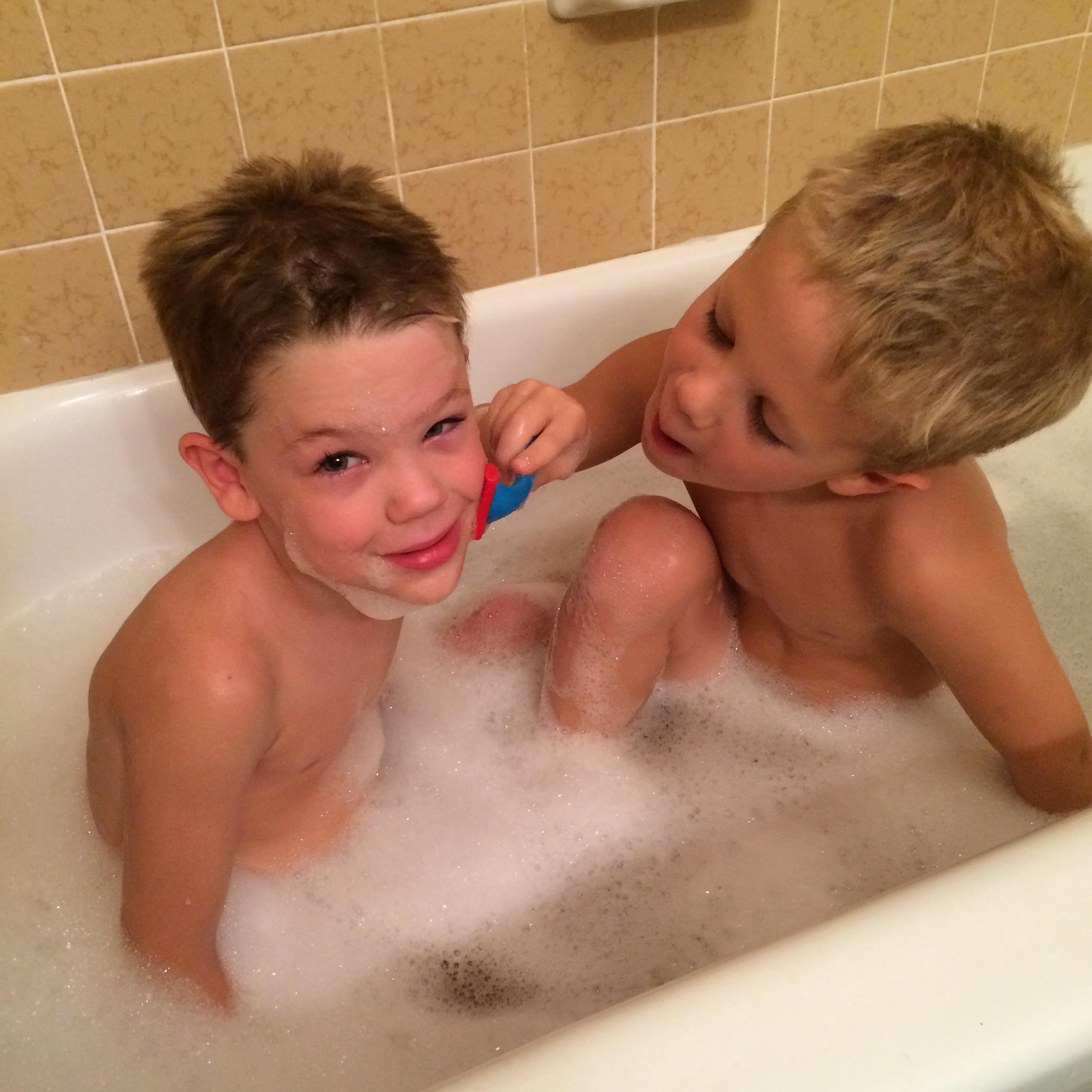 Shaving off the vacation beard.