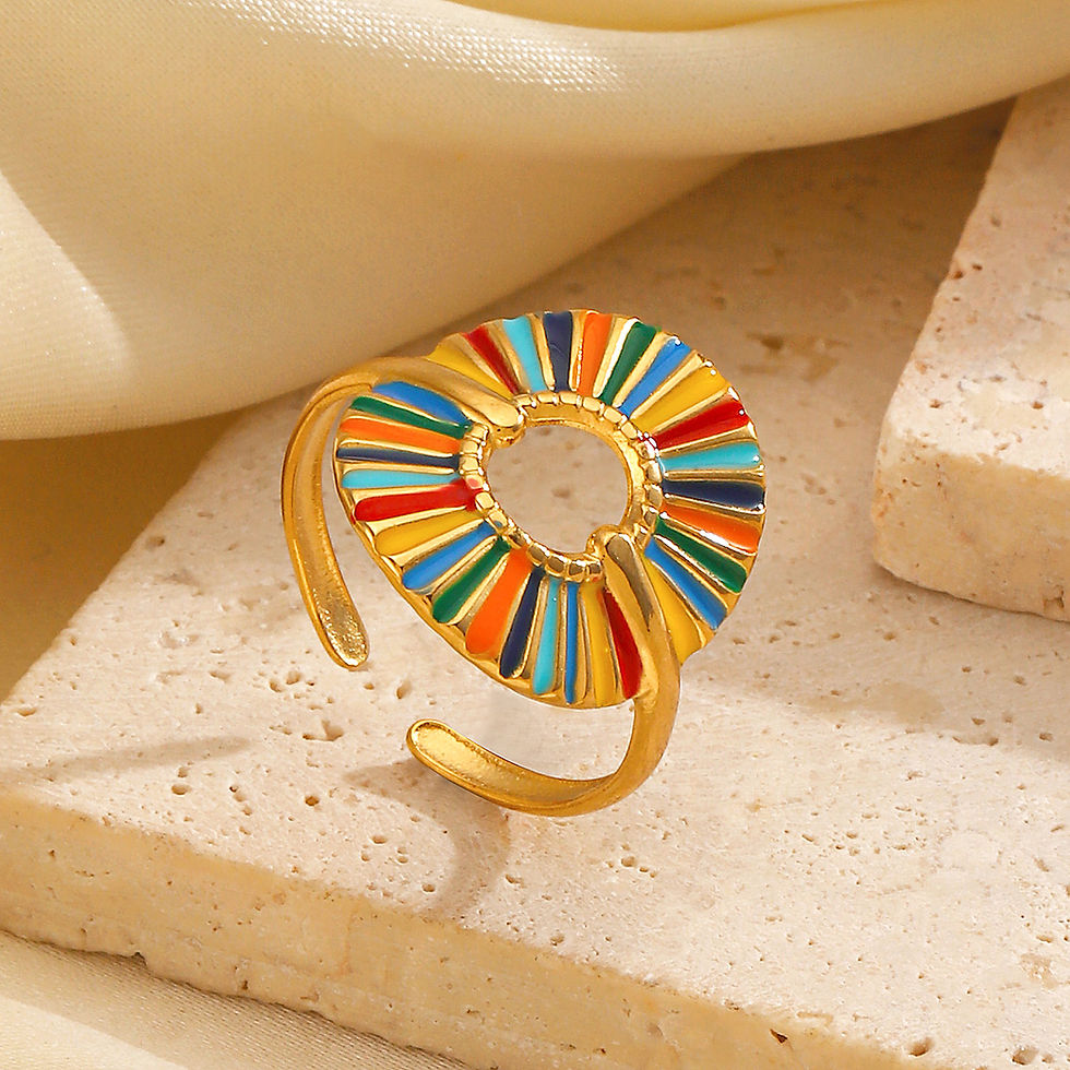 Gold ring with colorful enamel inlay, 9to5Jewels collection, on display.