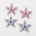 Four decorative starfish earrings in pink and blue floral designs 9to5Jewels