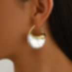 Woman wearing gold and white Leafy Earrings, close-up shot, 9to5Jewels.