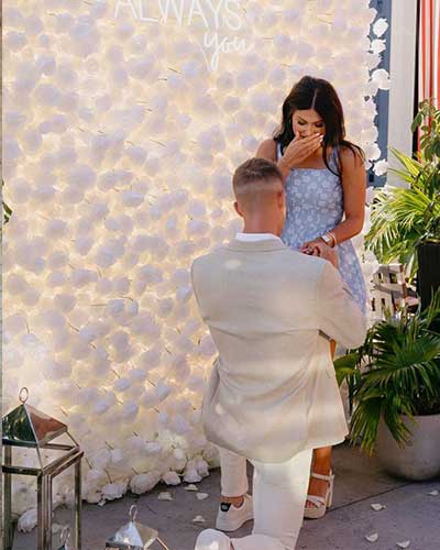 Proposal with floral backdrop