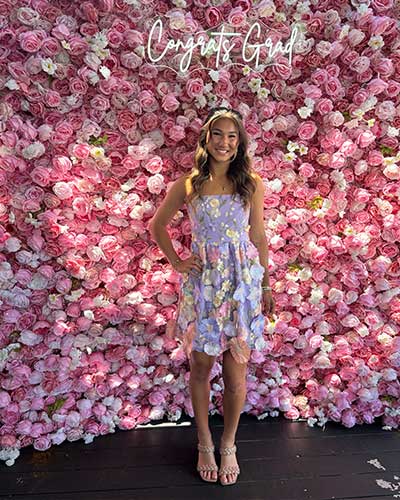 Event with floral backdrop rental