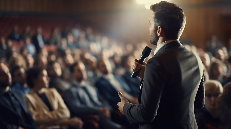 person-holding-speech-official-event.jpg