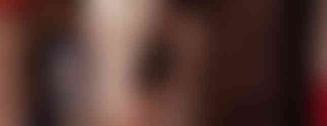 cow head hanging in front of a shop