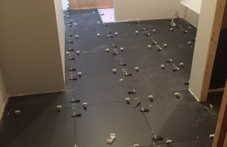 Homme à tout faire à Québec - installation pose plancher céramique chauffant