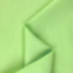 Fiji Lime Cotton Voile fabric swatch with soft folds