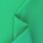 Fiji Emerald cotton voile fabric swatch with soft folds.
