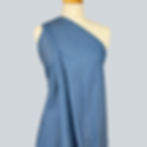 Mid blue lightweight 4.5oz denim fabric draped on mannequin.