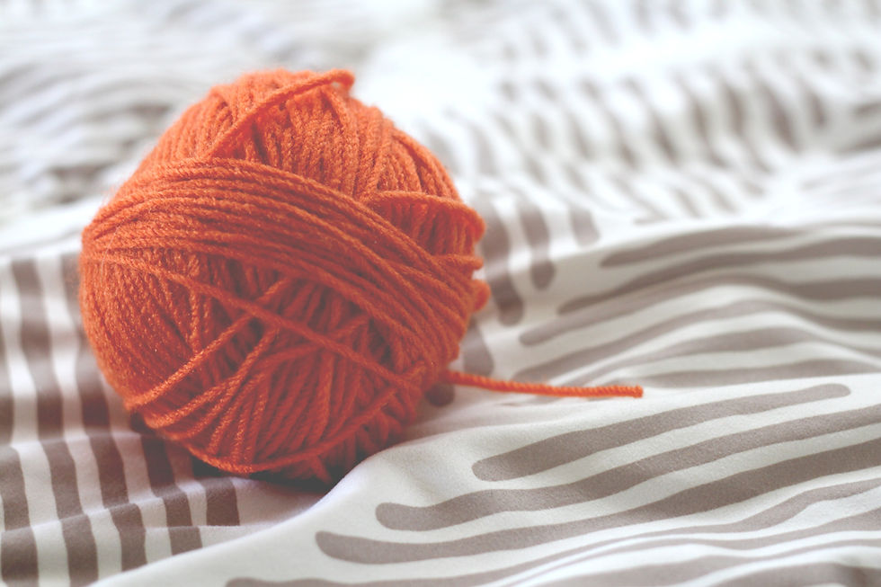 Ball of orange yarn_edited.jpg