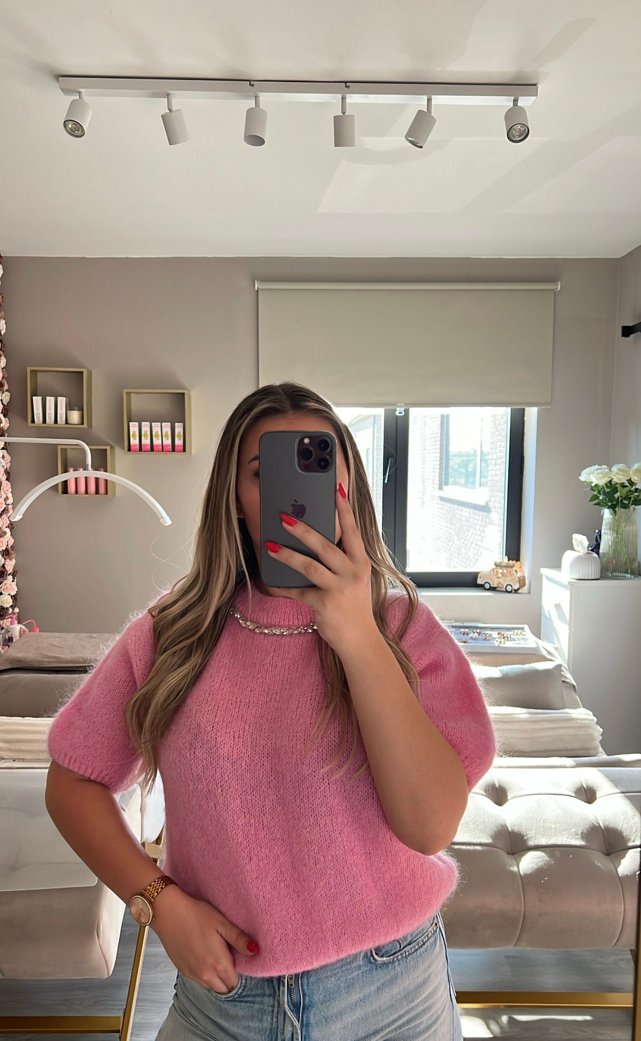 Roze trui met steentjes