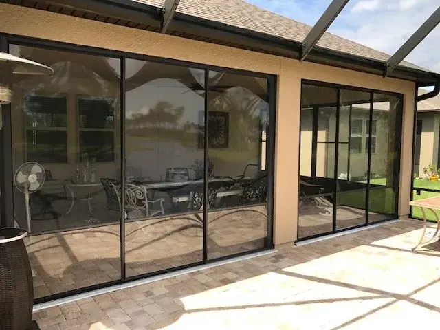 Glass Room on a tan house