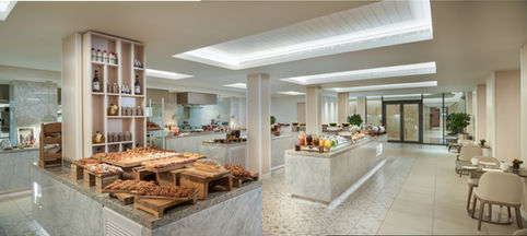 View of the buffet spread at the all-day dining restaurant, Crowne Plaza Muscat, showcasing a variety of delicious dishes, photographed by luxury hotel photographer Herbert Fernandes.