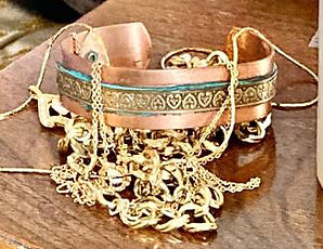 Estate auction items including jewelry and gold at All Seasons Estate Sales Spokane WA."