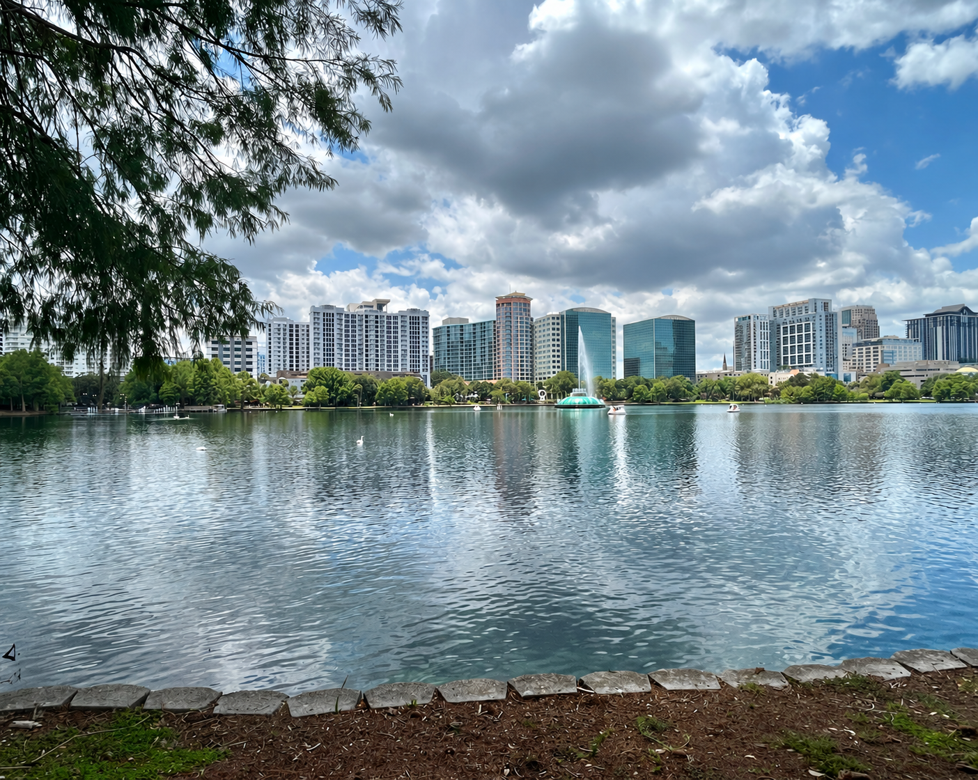 Lake Eola fountain and downtown Orlando skyline.