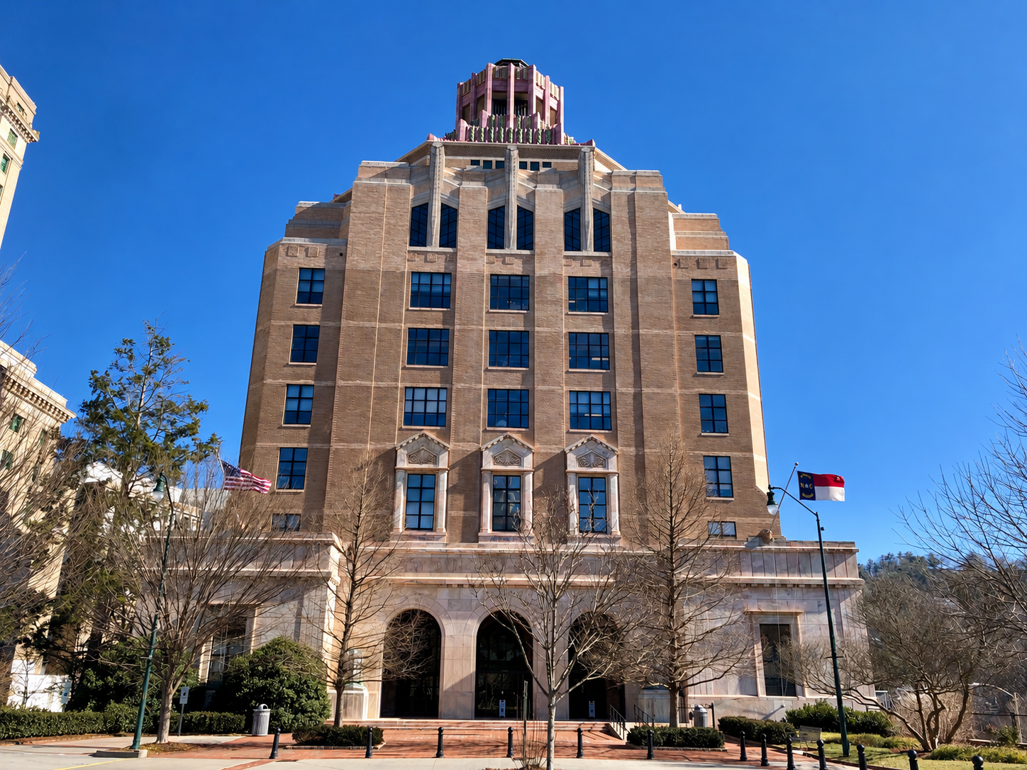 Art Deco Asheville City Hall beneath a blue sky.