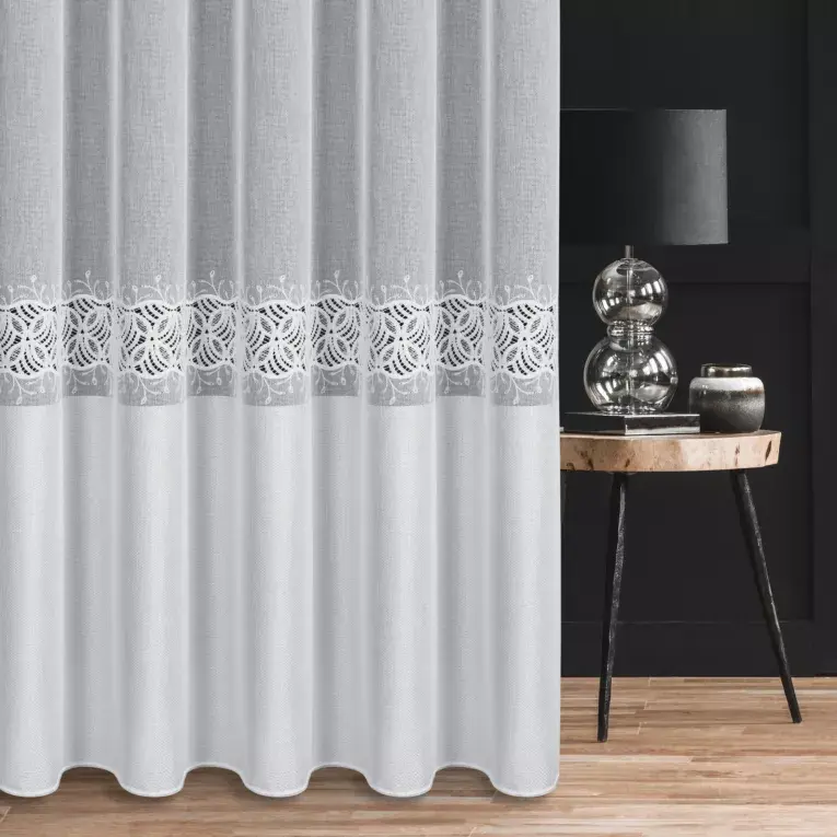 Thumbnail: Royal L167.3/White curtain decorated with applique and a wide woven belt.