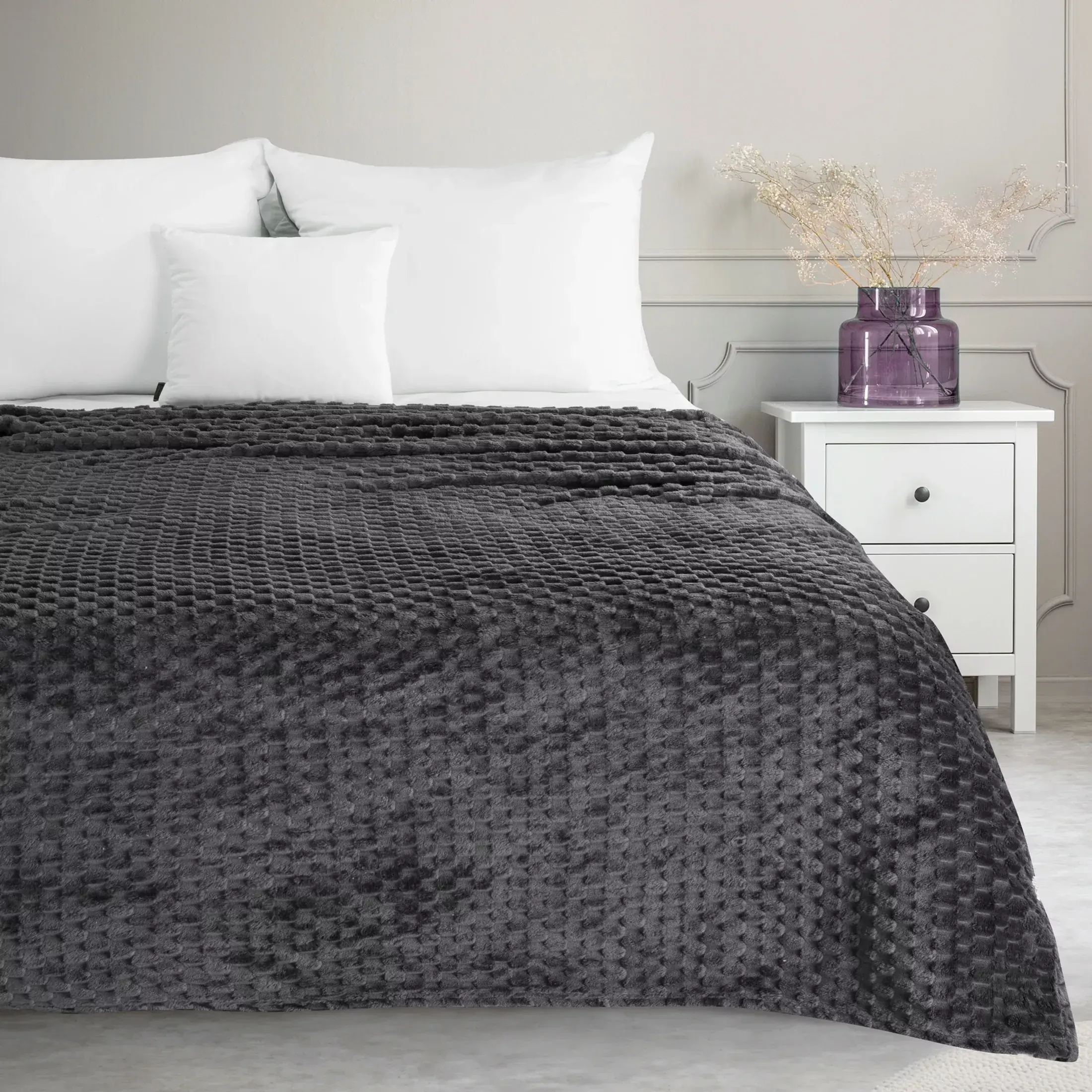 The blanket is steel, very soft to the touch, with an embossed 3D pattern.