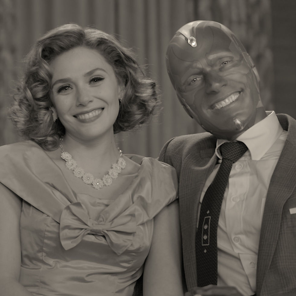 Wanda in a hex reality of a classic TV sitcom with Vision from WandaVision