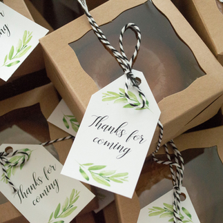 Winter wedding guest favors featuring elegant packaging with a wintery theme, suitable for the season's celebration.