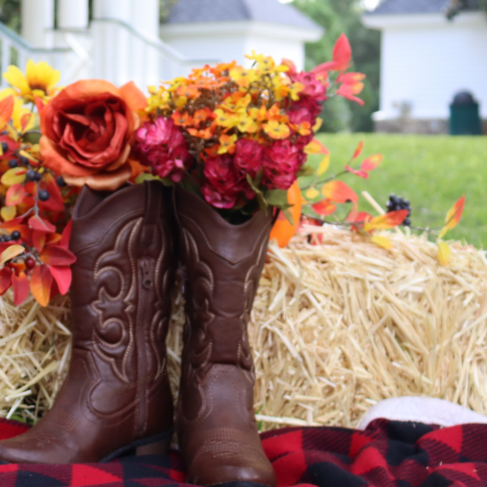 Boots filled with autumn flowers.