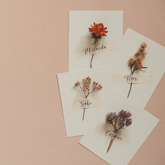 Elegant and Creative Place Cards – A thoughtful touch for your wedding reception, showcasing beautifully crafted cards with guests' names in artistic calligraphy