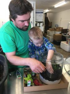 Making a terrarium together is a great Earth Day activity!