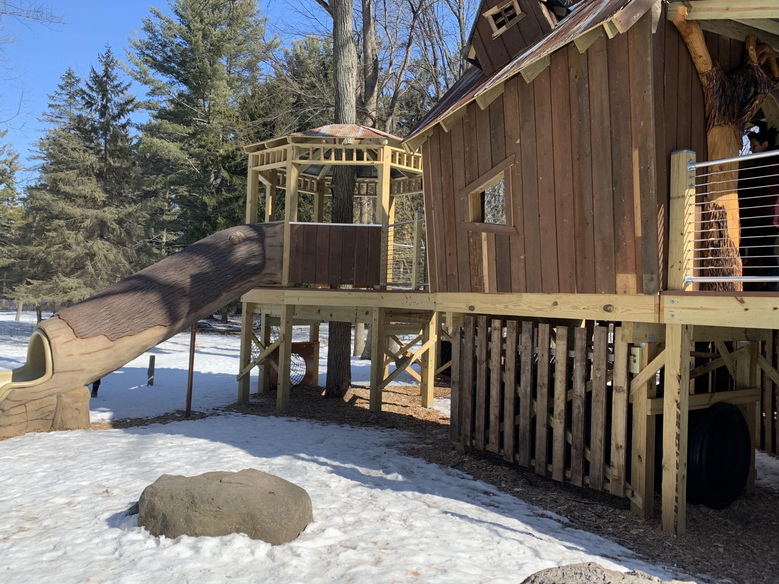 tree house with slide straight at Heckrodt Wetland Reserve