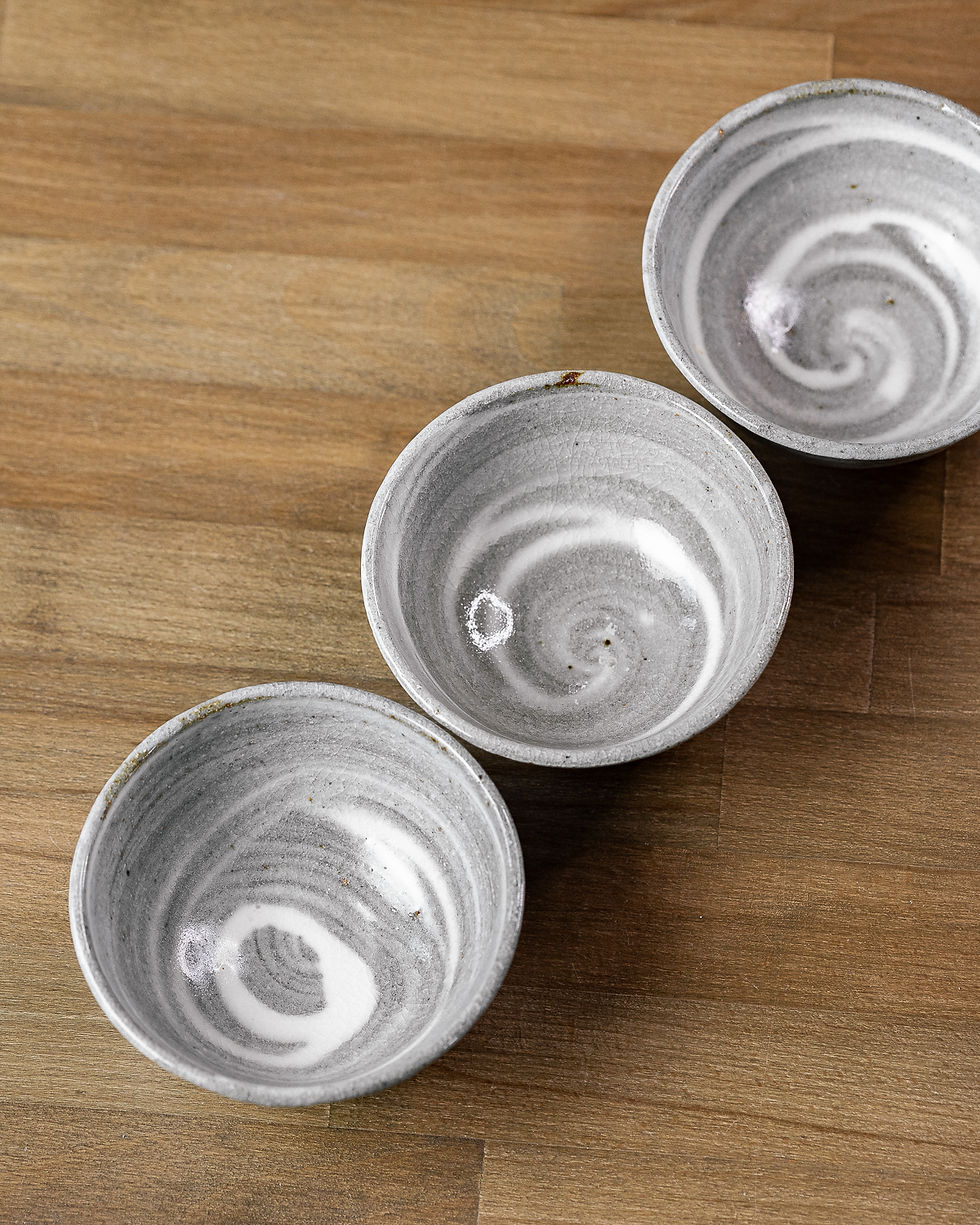 Thumbnail: Sidehandle dark unglazed with three grey monk bowls
