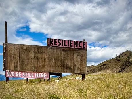 "Resilience. We're Still Here!" Billboard on Highway 3 in Cawston, British Columbia
