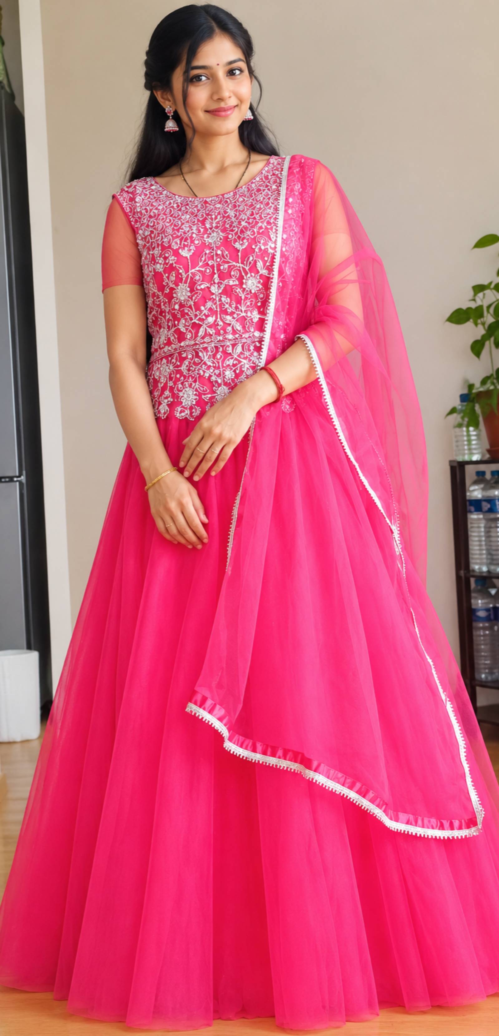 பிங்க் நிற எம்பிராய்டரி அனார்கலி ஆடை