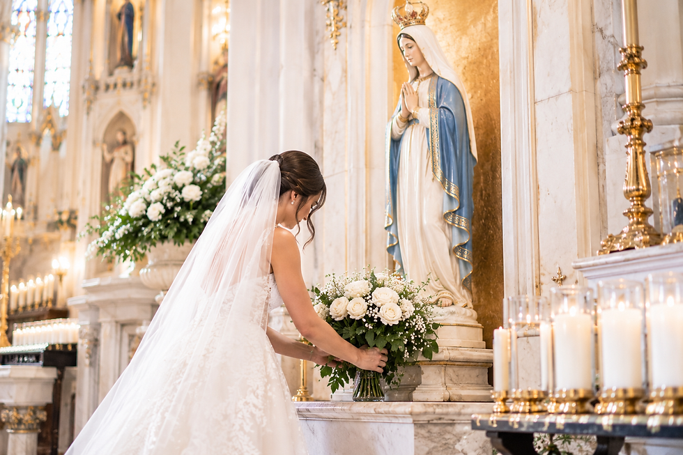 Bride giving flowers to Mary during Catholic wedding Marian devotion