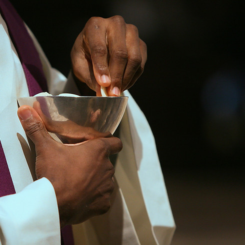 Giving Holy Communion_edited.jpg
