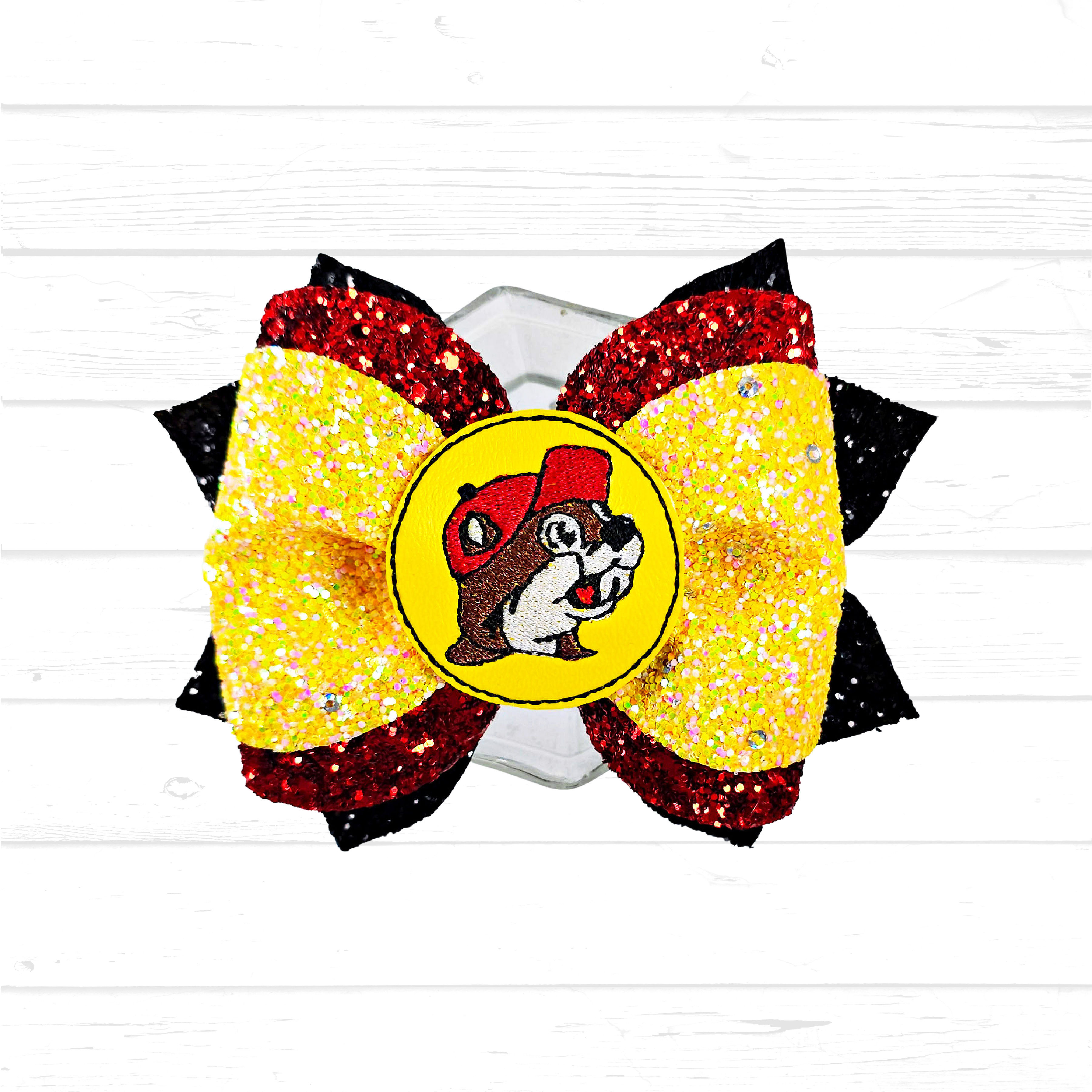 'Bu-cees' faux leather/glitter bow
