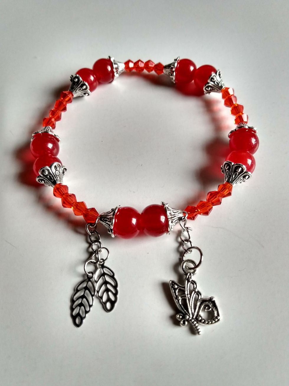 Thumbnail: Solid red and crystal beads