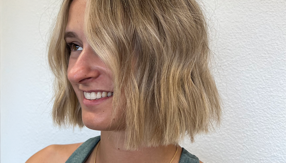 Blonde short haircut with piecey waves. 