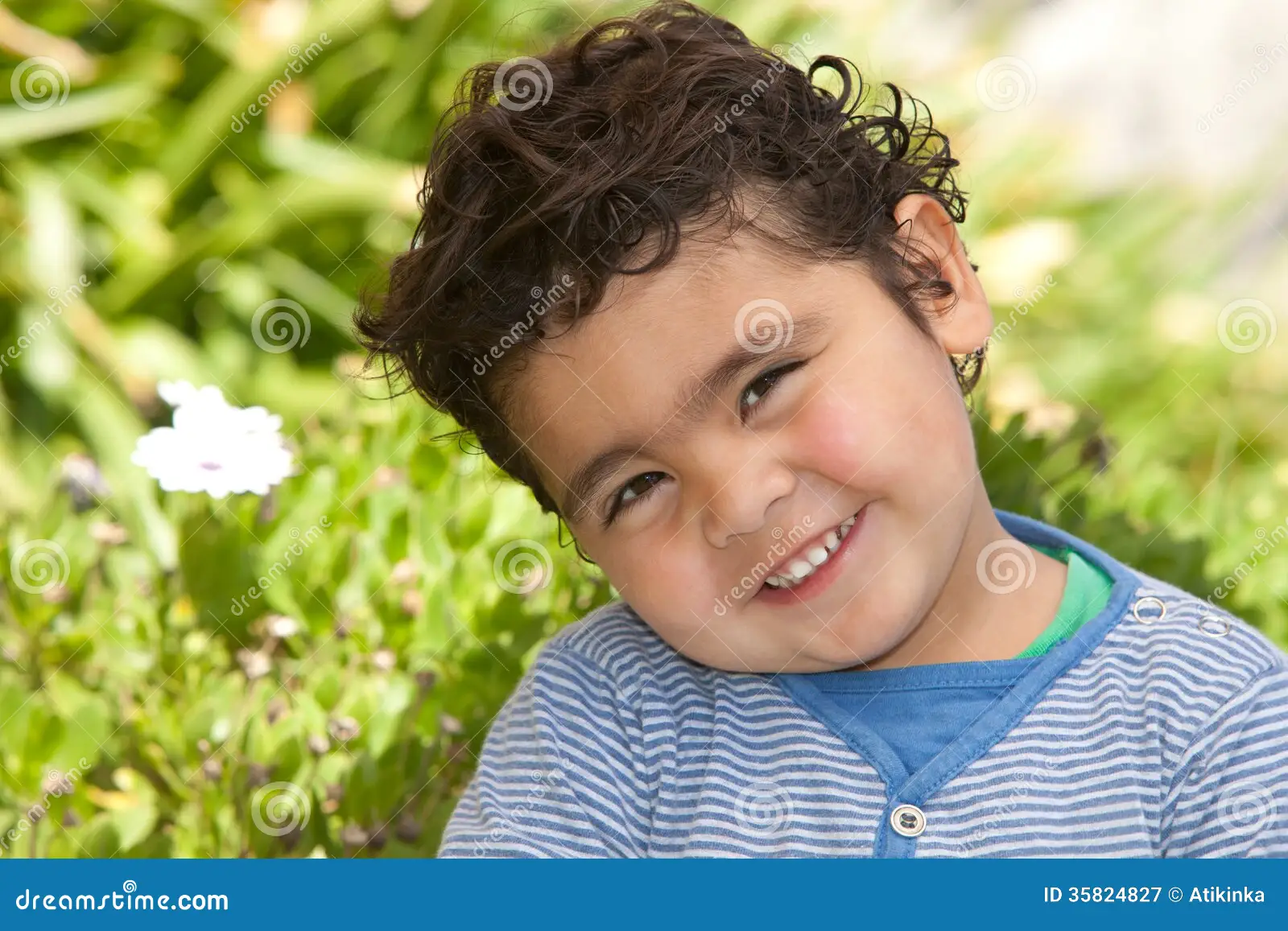 happy-toddler-portrait-outdoors-35824827.webp