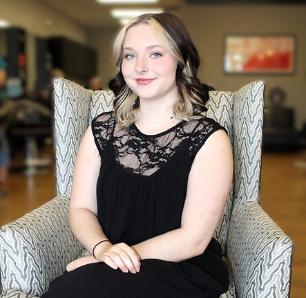 Young woman in a black dress sitting in a chair Collage Salon