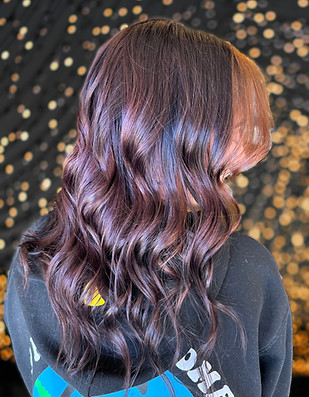 Wavy Brunet with Fairy Light Backdrop