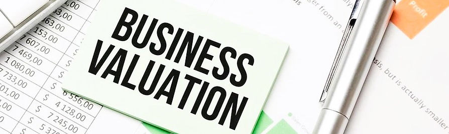 Business broker reviewing financials for a confidential business valuation in Phoenix AZ.