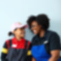 Black job coaching working with an autistic 35 year old white girl who is wearing McDonald