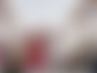 Indian bride and groom walking hand in hand after their Hindu wedding ceremony in Mexico, surrounded by family and flower petals, captured in a candid moment at an Indian destination wedding