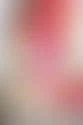 Detail of pink and orange draped mandap with white roses, yellow marigolds, and ceremonial setup for Bhavik and Rhia’s Pithi and Haldi at Garza Blanca Cancun, overlooking the Caribbean Sea.