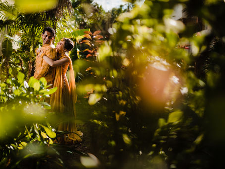 Colorful Indian wedding at Dreams Sapphire with Haldi in Yaxché Garden, poolside events, and beachside mandap.