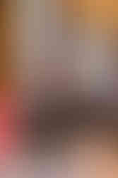 Close-up of a coconut placed over a sacred wedding fire during a Hindu wedding ceremony at Garza Blanca Cancun, part of the ritual offerings.