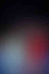 Rishabh, dressed in a black patterned sherwani, is lifted high into the air by friends and family on the glowing LED dance floor, as Devina in a turquoise lehenga smiles beside them during their Sangeet night at Moon Palace Cancún.