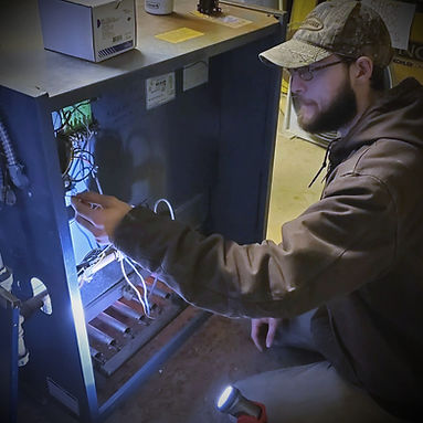 Emergency HVAC Technician Repairs a Furnace in Tiffin, Ohio