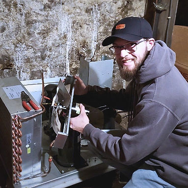 Furnace HVAC Technician Repairs Furnace in Tiffin, Ohio